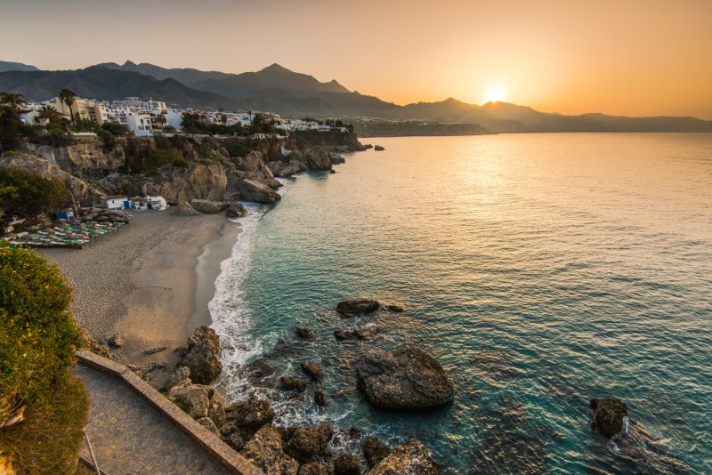 Beautiful sunrise over beach in nerja,andalusia,spain